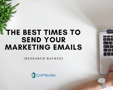 a person typing on a laptop with the words the best times to send your marketing emails