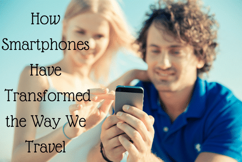 a man and woman looking at a cell phone