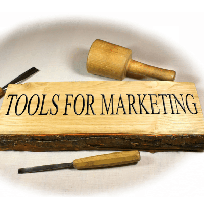 a wooden sign that says tools for marketing